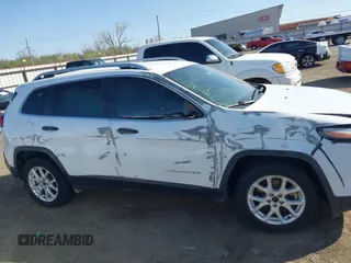 2018 Jeep Cherokee Latitude Tech Connect z VIN 1C4PJLCB3JD566741, wystawiony jako IAAI lot #41855103 z przebiegiem 97 829 mil mil oraz . Historia ofert i sprzedaży dostępna na DreamBid. Obrazek 13.