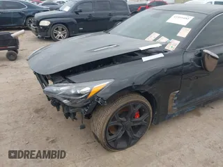 2020 Kia Stinger GT with VIN KNAE35LC2L6078391, listed as a IAAI auction lot 41409482 with 63,146 mi miles. Bid and sale history available at carsss.com. Image 6.