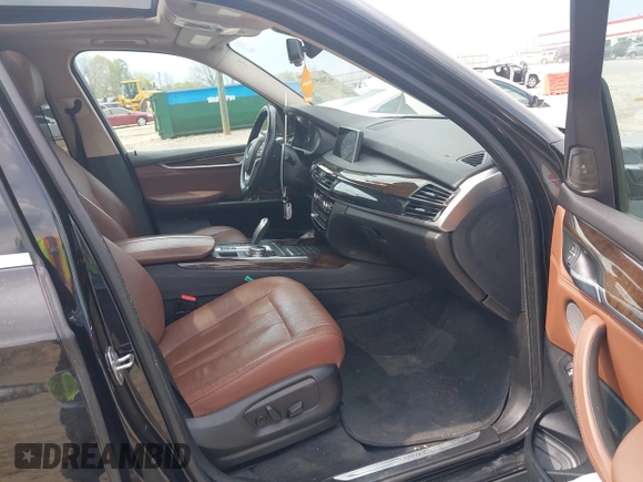 2016 BMW X5 xDrive35i z VIN 5UXKR0C55G0P26466, wystawiony jako IAAI lot #42005793 z przebiegiem 200 889 mil mil oraz . Historia ofert i sprzedaży dostępna na DreamBid. Obrazek 5.
