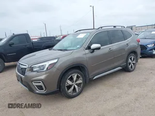 2021 Subaru Forester Touring with VIN JF2SKAXC9MH556986, listed as a IAAI auction lot 41717748 with 33,573 mi miles. Bid and sale history available at carsss.com. Image 17.