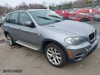 2011 BMW X5 35i with VIN 5UXZV4C53BL740732, listed as a IAAI auction lot 42008134 with 220,963 mi miles. Bid and sale history available at carsss.com. Image 1.