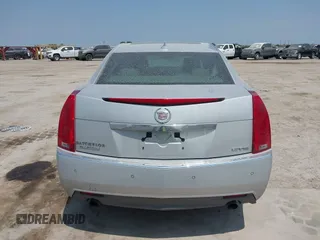 2009 Cadillac CTS RWD z VIN 1G6DV57V990149721, wystawiony jako IAAI lot #42293590 z przebiegiem 64 642 mil mil oraz . Historia ofert i sprzedaży dostępna na DreamBid. Obrazek 15.