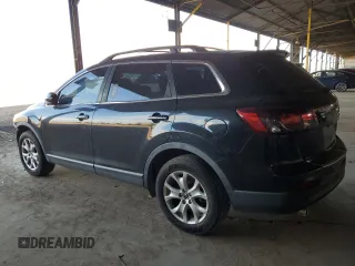 2015 Mazda CX-9 Touring с VIN JM3TB2CV1F0457586, выставлен на аукционе Copart как лот 63646475 с пробегом 125 509 миль миль и Чистый • Clean title. История ставок и продаж доступна на DreamBid. Изображение 2.