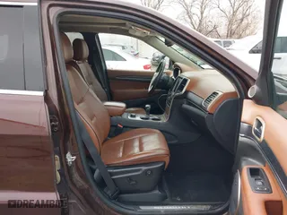 2015 Jeep Grand Cherokee Summit with VIN 1C4RJFJT7FC840560, listed as a IAAI auction lot 41596868 with 173,392 mi miles. Bid and sale history available at carsss.com. Image 5.