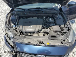 2018 Mazda 3 Touring z VIN 3MZBN1V30JM243211, wystawiony jako Copart lot #58324975 z przebiegiem 86 030 mil mil oraz Szkoda całkowita • Salvage title. Historia ofert i sprzedaży dostępna na DreamBid. Obrazek 11.