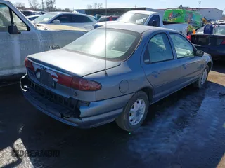 2000 Ford Contour SE Fleet with VIN 1FAFP66L5YK137824, listed as a IAAI auction lot 41610477 with 120,320 mi miles. Bid and sale history available at carsss.com. Image 4.