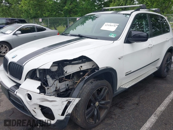 2012 BMW X5 35i с VIN 5UXZV4C5XCL765368, выставлен на аукционе IAAI как лот 42526136 с пробегом 165 365 миль миль и . История ставок и продаж доступна на DreamBid. Изображение 17.