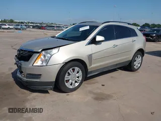 2015 Cadillac SRX z VIN 3GYFNAE37FS597695, wystawiony jako IAAI lot #42184666 z przebiegiem 106 210 mil mil oraz . Historia ofert i sprzedaży dostępna na DreamBid. Obrazek 2.