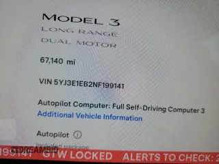 2022 Tesla Model 3 Long Range with VIN 5YJ3E1EB2NF199141, listed as a Copart auction lot 53069145 with 67,140 mi miles and Non Repairable. Bid and sale history available at DreamBid. Image 9.
