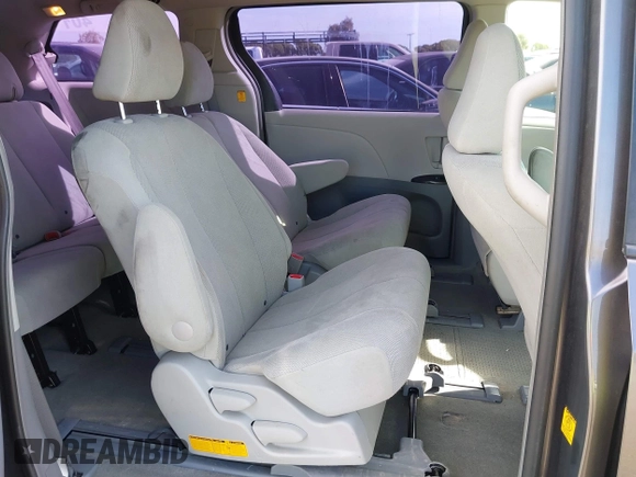 2012 Toyota Sienna with VIN 5TDKA3DC6CS011159, listed as a IAAI auction lot 41788426 with 246,133 mi miles and . Bid and sale history available at DreamBid. Image 8.