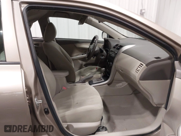 2010 Toyota Corolla with VIN 1NXBU4EE0AZ271333, listed as a IAAI auction lot 42308815 with 99,649 mi miles and . Bid and sale history available at DreamBid. Image 5.