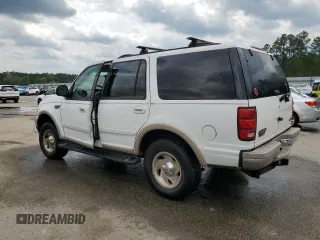 1999 Ford Expedition XLT z VIN 1FMPU18L0XLC10111, wystawiony jako Copart lot #52699205 z przebiegiem Nie podano mil oraz Szkoda całkowita • Salvage title. Historia ofert i sprzedaży dostępna na DreamBid. Obrazek 2.