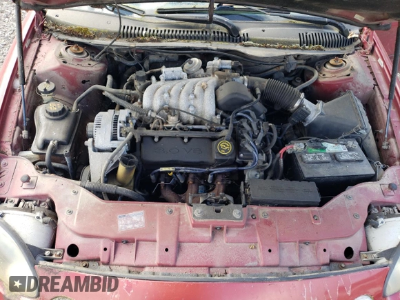 1997 Ford Taurus GL z VIN 1FALP52U4VG234295, wystawiony jako Copart lot #51112714 z przebiegiem 118 005 mil mil oraz Szkoda całkowita • Salvage title. Historia ofert i sprzedaży dostępna na DreamBid. Obrazek 11.
