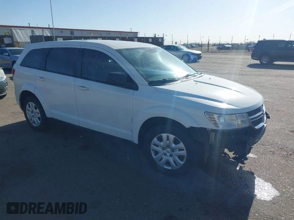 2015 Dodge Journey SE z VIN 3C4PDCAB4FT600293, wystawiony jako IAAI lot #41981386 z przebiegiem 143 573 mil mil oraz . Historia ofert i sprzedaży dostępna na DreamBid. Obrazek 1.