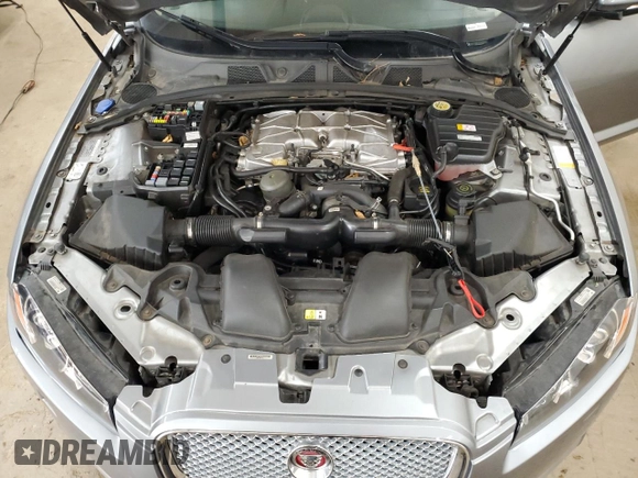 2015 Jaguar XF Portfolio with VIN SAJWJ0FF8F8U65883, listed as a Copart auction lot 55783945 with 133,431 mi miles and Salvage Title. Bid and sale history available at DreamBid. Image 11.