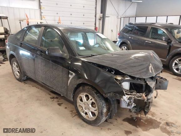 2008 Ford Focus SE with VIN 1FAHP35N08W157353, listed as a IAAI auction lot 41612196 with NaN miles. Bid and sale history available at carsss.com. Image 1.