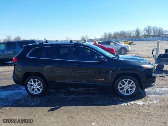 2014 Jeep Cherokee Latitude with VIN 1C4PJLCS3EW287378, listed as a IAAI auction lot 41655723 with 100,927 mi miles. Bid and sale history available at carsss.com. Image 13.