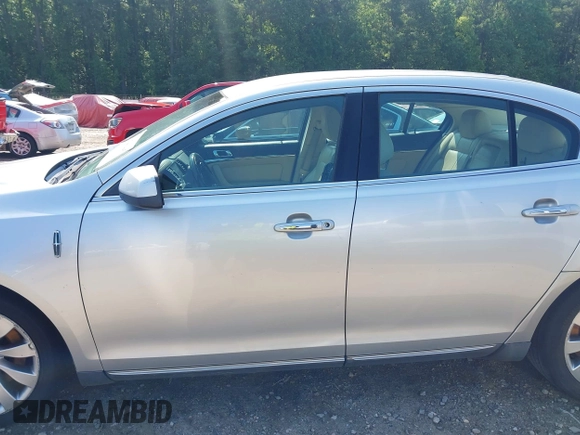 2013 Lincoln MKS with VIN 1LNHL9DK3DG614933, listed as a IAAI auction lot 42549445 with 313,182 mi miles and . Bid and sale history available at DreamBid. Image 14.