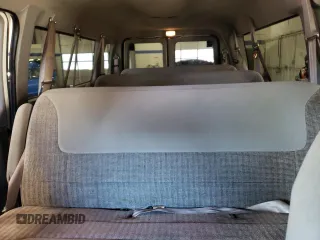 1999 Ford Econoline Passenger XL with VIN 1FBSS31L0XHB37226, listed as a Copart auction lot 46419355 with 51,209 mi miles and Clean Title. Bid and sale history available at DreamBid. Image 10.
