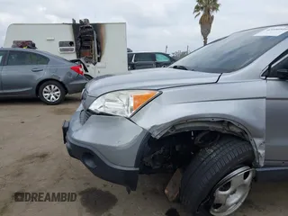 2007 Honda CR-V LX with VIN JHLRE38397C020722, listed as a IAAI auction lot 42100516 with 161,561 mi miles. Bid and sale history available at carsss.com. Image 6.