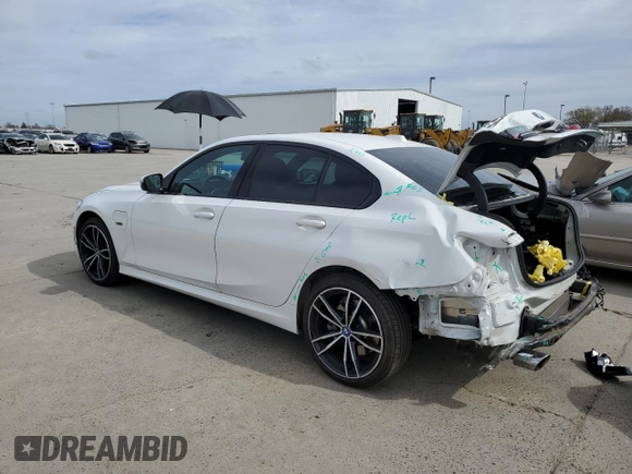 2023 BMW 3 Series 330e with VIN 3MW39FF00P8C93893, listed as a Copart auction lot 46110105 with 40,381 mi miles and Salvage Title. Bid and sale history available at carsss.com. Image 2.