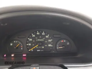 1999 Suzuki Swift z VIN 2S2AB21H1X6603139, wystawiony jako IAAI lot #42288621 z przebiegiem 130 443 mil mil oraz . Historia ofert i sprzedaży dostępna na DreamBid. Obrazek 7.