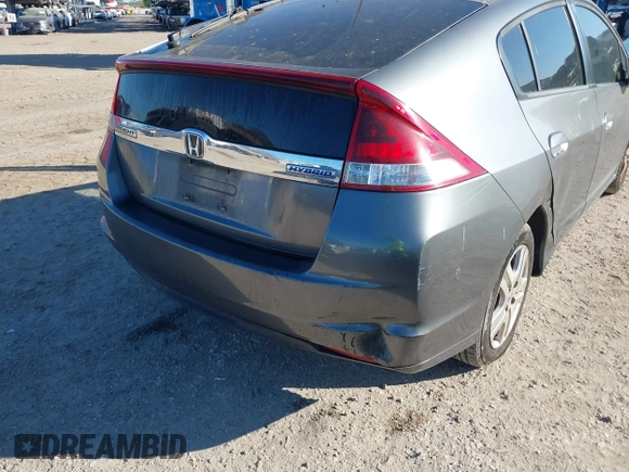 2012 Honda Insight LX with VIN JHMZE2H51CS003694, listed as a IAAI auction lot 41781384 with 154,685 mi miles and . Bid and sale history available at DreamBid. Image 6.