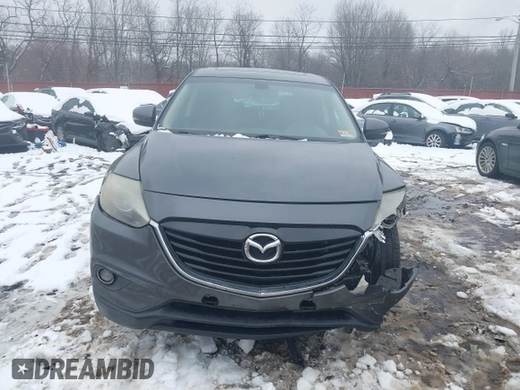 2014 Mazda CX-9 Grand Touring with VIN JM3TB3DV9E0440506, listed as a IAAI auction lot 41537718 with 217,299 mi miles and . Bid and sale history available at DreamBid. Image 12.