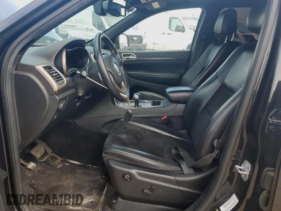 2014 Jeep Grand Cherokee Laredo with VIN 1C4RJFAG4EC486790, listed as a Copart auction lot 55314735 with 143,096 mi miles and Salvage Title. Bid and sale history available at DreamBid. Image 7.