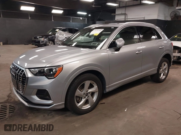 2021 Audi Q3 Premium with VIN WA1AUCF34M1078805, listed as a IAAI auction lot 42026360 with 38,473 mi miles and . Bid and sale history available at DreamBid. Image 2.