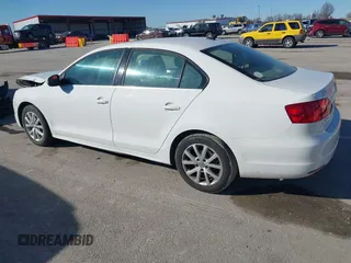 2013 Volkswagen Jetta SE with VIN 3VWDX7AJ8DM424751, listed as a IAAI auction lot 41659290 with 123,408 mi miles and . Bid and sale history available at DreamBid. Image 3.