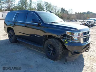 2019 Chevrolet Tahoe LT with VIN 1GNSKBKC3KR345776, listed as a IAAI auction lot 41674948 with 119,871 mi miles. Bid and sale history available at carsss.com. Image 1.