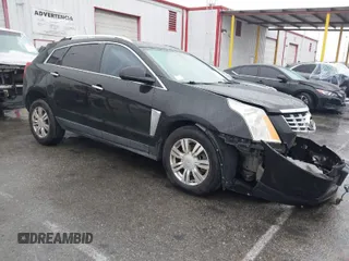2016 Cadillac SRX Luxury Collection with VIN 3GYFNBE34GS575502, listed as a IAAI auction lot 41572367 with 124,615 mi miles. Bid and sale history available at carsss.com. Image 1.