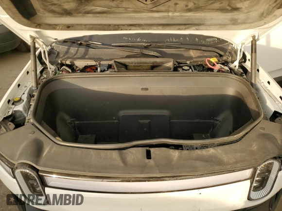 2022 Rivian R1T Adventure z VIN 7FCTGAAA9NN014280, wystawiony jako Copart lot #87908175 z przebiegiem 28 601 mil mil oraz Szkody całkowita. Historia ofert i sprzedaży dostępna na DreamBid. Obrazek 11.