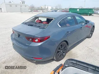 2024 Mazda 3 S Carbon Edition with VIN 3MZBPBCM3RM416565, listed as a IAAI auction lot 42047841 with 11,074 mi miles and . Bid and sale history available at DreamBid. Image 4.