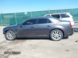 2016 Chrysler 300 Anniversary Edition with VIN 2C3CCARG7GH230414, listed as a IAAI auction lot 41853857 with 84,639 mi miles and . Bid and sale history available at DreamBid. Image 14.
