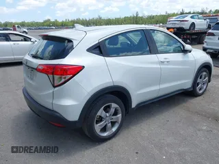 2021 Honda HR-V LX with VIN 3CZRU5H33MM728433, listed as a IAAI auction lot 42077620 with 34,861 mi miles and . Bid and sale history available at DreamBid. Image 4.