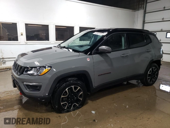 2020 Jeep Compass Trailhawk with VIN 3C4NJDDB0LT215553, listed as a Copart auction lot 45045165 with 90,702 mi miles and Salvage Title. Bid and sale history available at carsss.com. Image 1.
