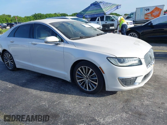 2017 Lincoln MKZ Hybrid Premiere с VIN 3LN6L5KU1HR631619, выставлен на аукционе IAAI как лот 39746492 с пробегом Не указан миль и . История ставок и продаж доступна на DreamBid. Изображение 16.