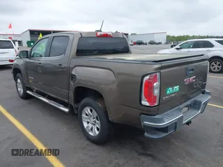2015 GMC Canyon 2WD SLE with VIN 1GTG5BE38F1229799, listed as a IAAI auction lot 41944801 with 71,165 mi miles. Bid and sale history available at carsss.com. Image 3.