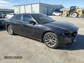 2015 Dodge Charger SXT with VIN 2C3CDXHG4FH875134, listed as a Copart auction lot 47399045 with 88,231 mi miles and Salvage Title. Bid and sale history available at DreamBid. Image 4.