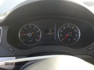 2013 Volkswagen Jetta SE z VIN 3VWDX7AJ8DM428539, wystawiony jako Copart lot #49662365 z przebiegiem 122 768 mil mil oraz Szkoda całkowita • Salvage title. Historia ofert i sprzedaży dostępna na DreamBid. Obrazek 9.