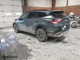 2023 Kia Sportage Hybrid SX-Prestige with VIN KNDPXCAG4P7010992, listed as a IAAI auction lot 41590365 with 54,016 mi miles. Bid and sale history available at carsss.com. Image 3.