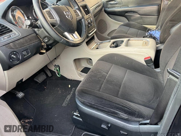 2013 Dodge Grand Caravan SXT with VIN 2C4RDGCG1DR616704, listed as a IAAI auction lot 42128513 with 112,210 mi miles and . Bid and sale history available at DreamBid. Image 1.