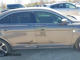 2015 Ford Taurus SEL with VIN 1FAHP2E84FG177553, listed as a IAAI auction lot 41753755 with 153,252 mi miles and . Bid and sale history available at carsss.com. Image 14.