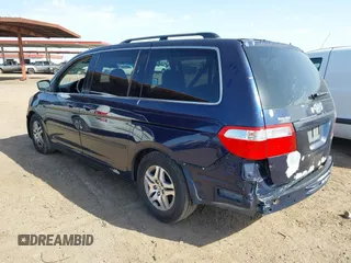 2005 Honda Odyssey EX-L with VIN 5FNRL38755B007567, listed as a IAAI auction lot 41952348 with 183,514 mi miles and . Bid and sale history available at carsss.com. Image 3.