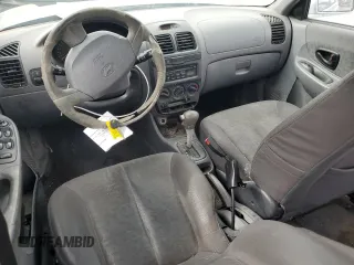 2004 Hyundai Accent GL with VIN KMHCG45C34U567915, listed as a Copart auction lot 43654985 with 141,461 mi miles and Clean Title. Bid and sale history available at carsss.com. Image 8.
