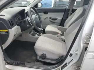 2009 Hyundai Accent Auto GLS z VIN KMHCN46C19U373167, wystawiony jako Copart lot #60026445 z przebiegiem 94 736 mil mil oraz Szkoda całkowita • Salvage title. Historia ofert i sprzedaży dostępna na DreamBid. Obrazek 7.