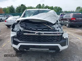 2021 Chevrolet Tahoe Commercial z VIN 1GNSKLEDXMR359932, wystawiony jako IAAI lot #42275551 z przebiegiem 24 mil mil oraz . Historia ofert i sprzedaży dostępna na DreamBid. Obrazek 11.