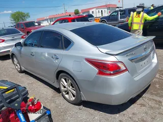 2013 Nissan Altima SV with VIN 1N4AL3AP4DN472936, listed as a IAAI auction lot 42053589 with 180,801 mi miles and . Bid and sale history available at carsss.com. Image 3.